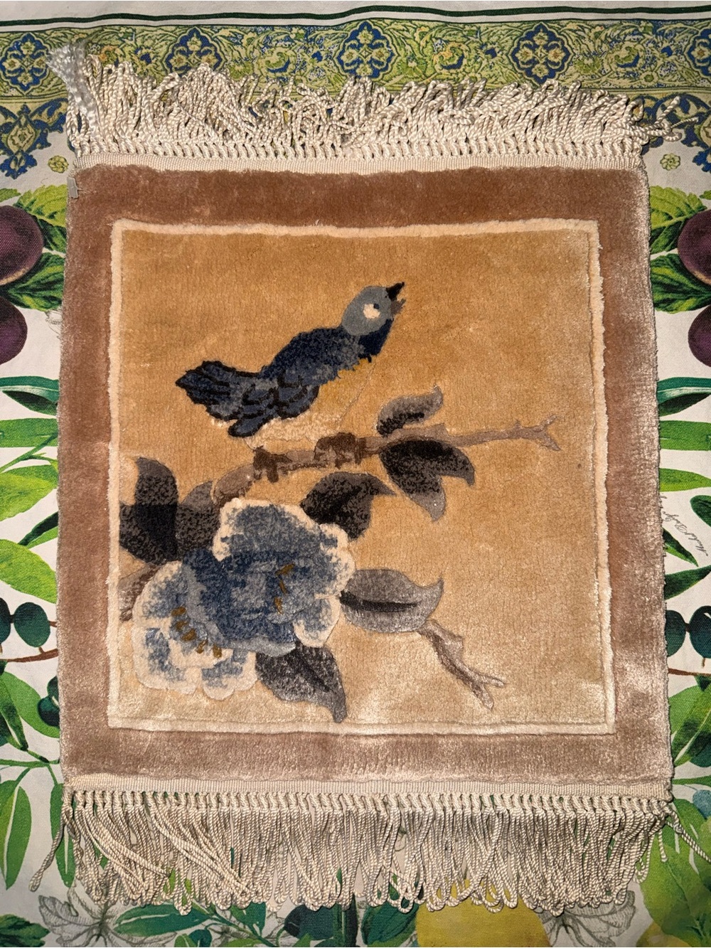 Vtg. Chinese hand-woven silk rug with bird and floral motifs.